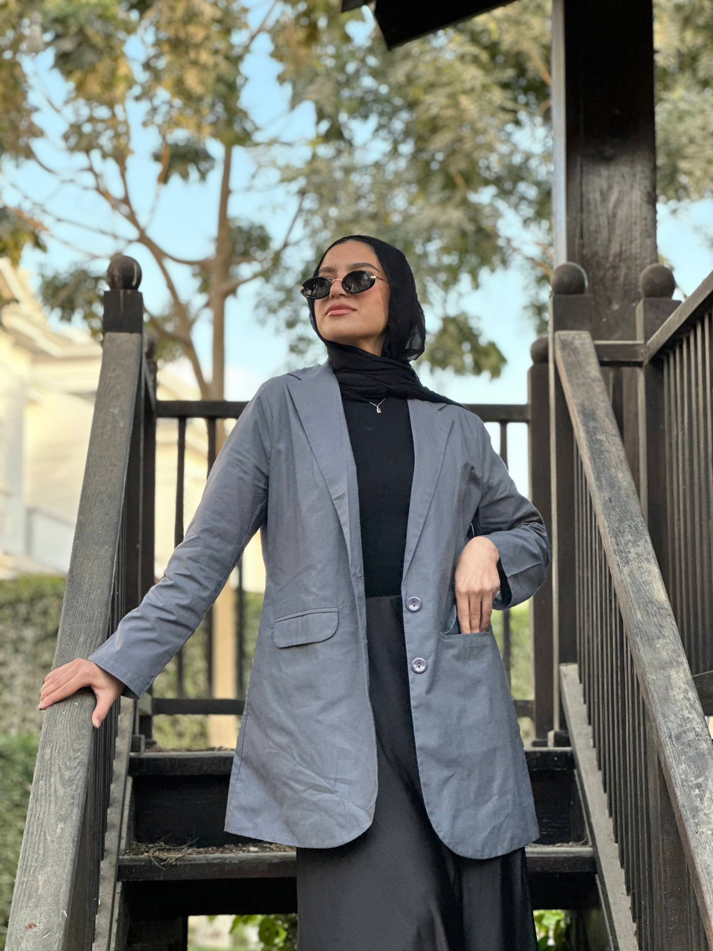 The linen blazer ( in grey )
