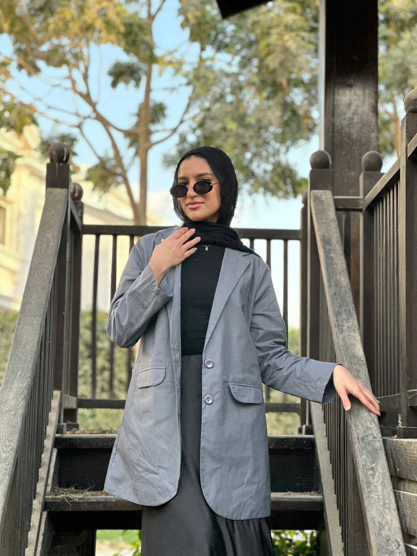 The linen blazer ( in grey )