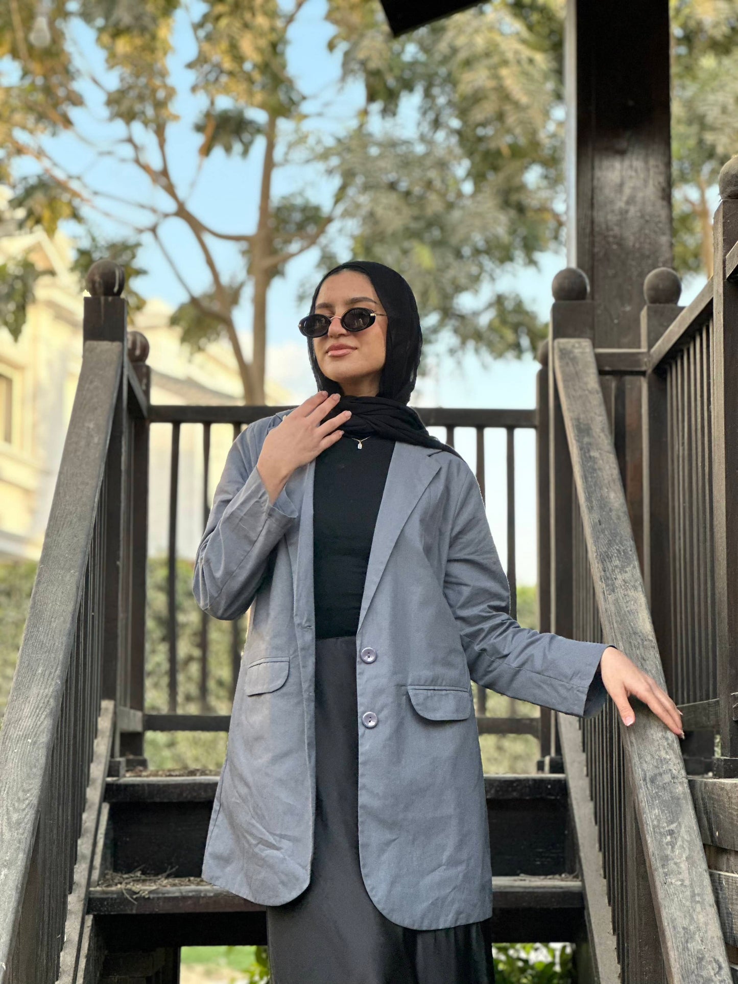 The linen blazer ( in grey )