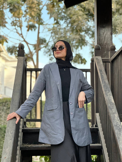 The linen blazer ( in grey )