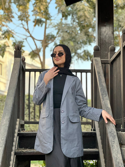 The linen blazer ( in grey )